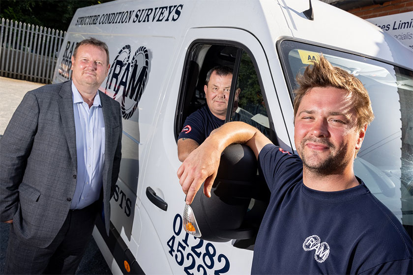 Business owners featured with van